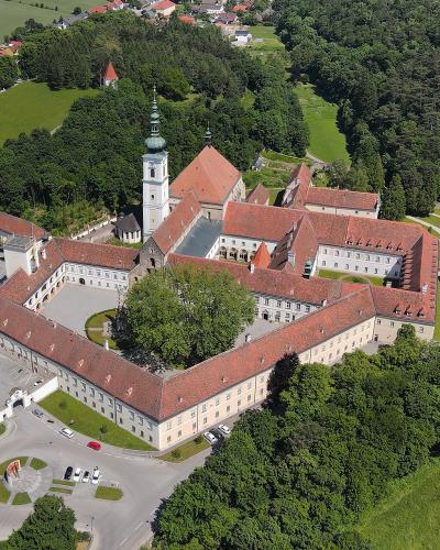 Aerial view of Heiligenkreuz Abbey, a Cistercian monastery in the Vienna Woods, Lower Austria