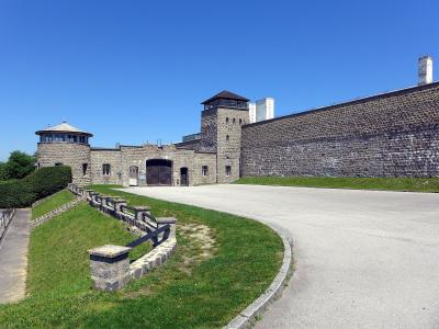 Stone walls and guard towers at the entrance of the Mauthausen Memorial, Upper Austria