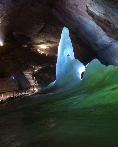 Illuminated ice formations inside the Dachstein Giant Ice Cave near Obertraun