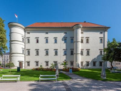Renaissance facade and round corner towers of Porcia Castle in Spittal an der Drau