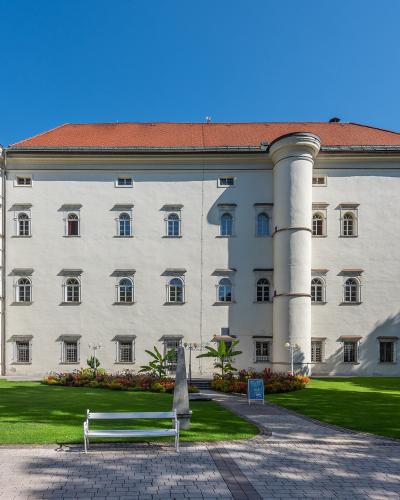 Renaissance facade and round corner towers of Porcia Castle in Spittal an der Drau
