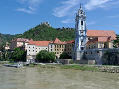 Dürnstein Abbey with its blue-and-white baroque tower on the Danube, castle ruins above