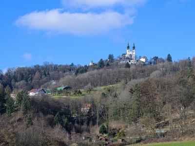 Poestlingberg hill in Linz crowned by the twin-towered pilgrimage basilica