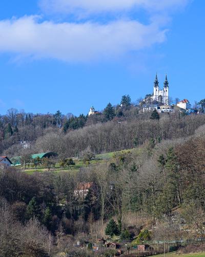 Poestlingberg hill in Linz crowned by the twin-towered pilgrimage basilica