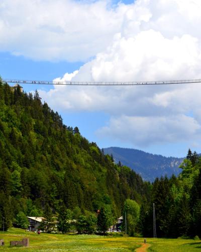 Highline179 pedestrian suspension bridge spanning the valley by Ehrenberg castle ruins near Reutte, Tyrol