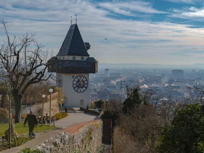 Uhrturm clock tower on the Schlossberg overlooking the city of Graz, Austria