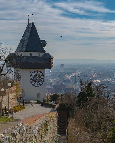 Uhrturm clock tower on the Schlossberg overlooking the city of Graz, Austria