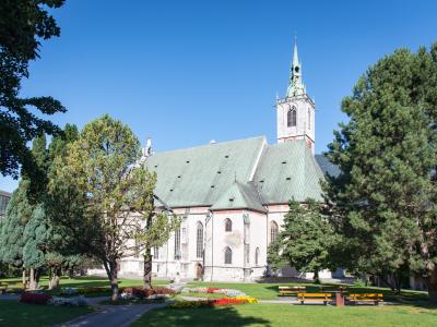 The Gothic parish church of Schwaz with its green roof and tall tower