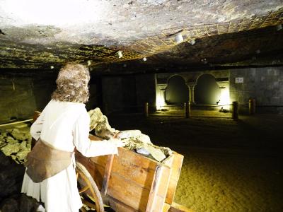 Historic salt-mining scene with figures inside the Salzwelten salt mine at Hallein