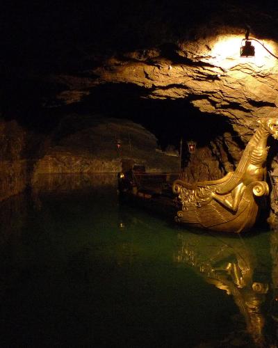 Golden dragon boat on the underground lake of Seegrotte Hinterbruhl, Lower Austria