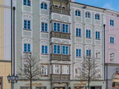 Historic baroque facade at Hauptplatz 10 on Linz's cobbled main square, Upper Austria