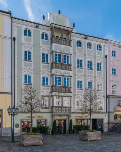 Historic baroque facade at Hauptplatz 10 on Linz's cobbled main square, Upper Austria
