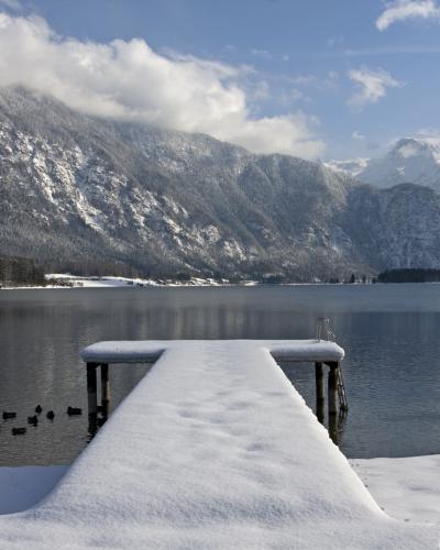 Jetty at Strandbad Untersee in Bad Goisern with Hallstattersee and the Dachstein massif beyond