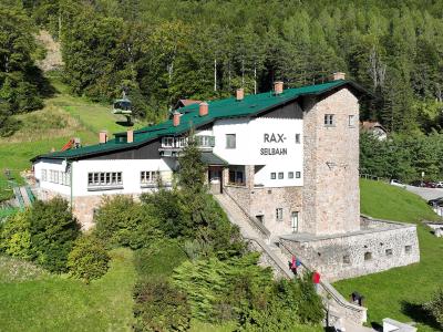 Valley station of the Rax cable car in Reichenau an der Rax with a gondola on the line above