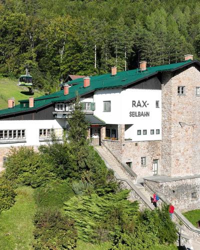 Valley station of the Rax cable car in Reichenau an der Rax with a gondola on the line above