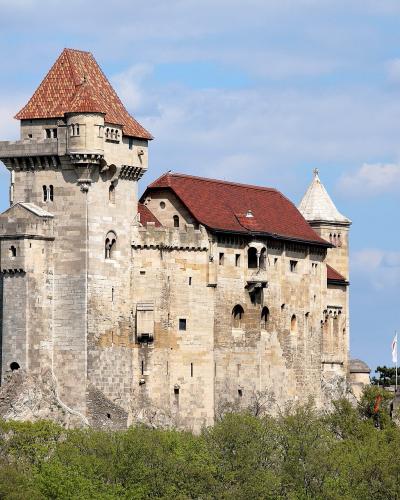 Liechtenstein Castle on its wooded hilltop in Maria Enzersdorf, Lower Austria