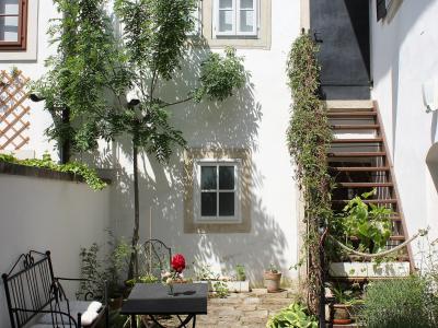 Flower-filled courtyard of the Haydn House museum in Eisenstadt